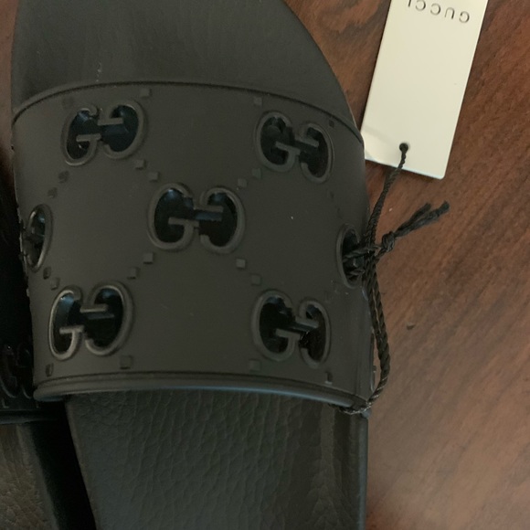 Gucci Shoes - Rubber GG Slides Sandals